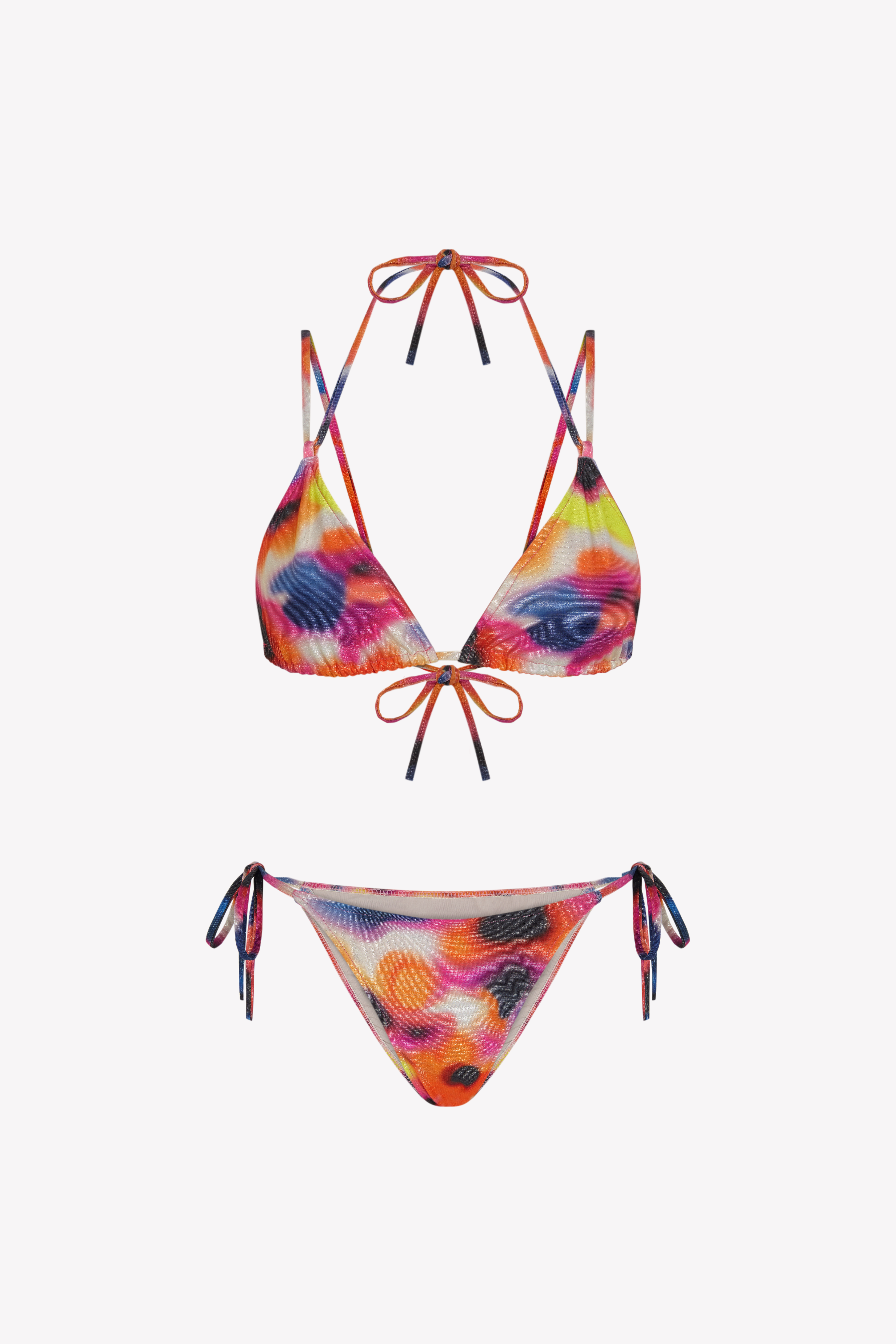 Bikini sostenible Lise Gara Calei. Top triangular multiposición y braga normal con lazada. Tejido ECOWAVE® con estampado tie-dye acuarelado y acabado lúrex. Hecho en España con producción ética.