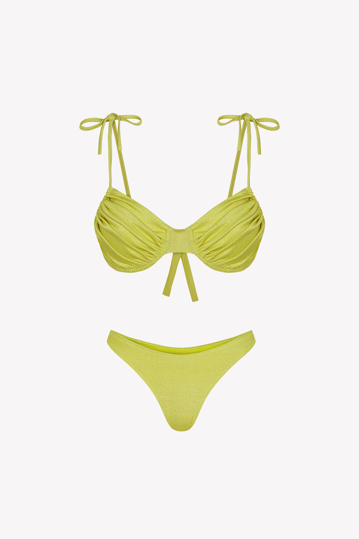 Bikini sostenible Gara Maca Lima de CIRCU. Top fruncido con aros y tirantes ajustables, combinado con braga tanga. Tejido ECOWAVE® en color lima vibrante con acabado brillante de lúrex. Hecho éticamente en España.
