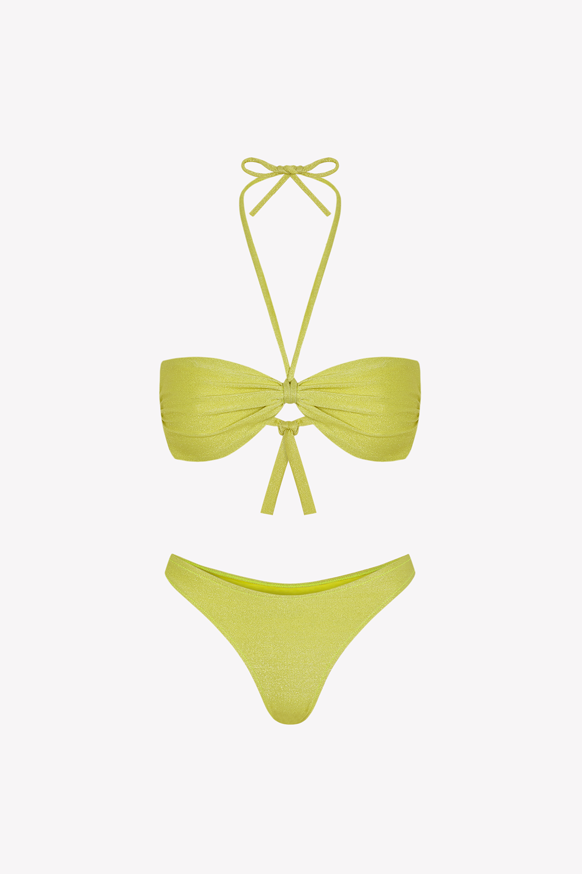 Bikini sostenible Maca Samba de CIRCU. Top bandeau fruncido multiposición con cinta ajustable y braga tanga. Tejido ECOWAVE® con estampado de rayas horizontales multicolor y acabado con lúrex. Hecho de forma ética en España.