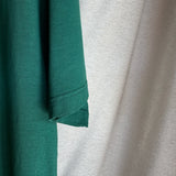 Camiseta oversize unisex en color verde, confeccionada en 100% algodón orgánico, con impresión digital exclusiva en la parte delantera. Moda streetwear sostenible