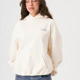 Sudadera oversize unisex con capucha en color blanco beige, confeccionada en algodón orgánico 100% con acabado French Terry. Su diseño exclusivo, con impresión digital en la parte delantera y trasera, combina comodidad, estilo y sostenibilidad. Una hoodie streetwear perfecta para un look casual y versátil.