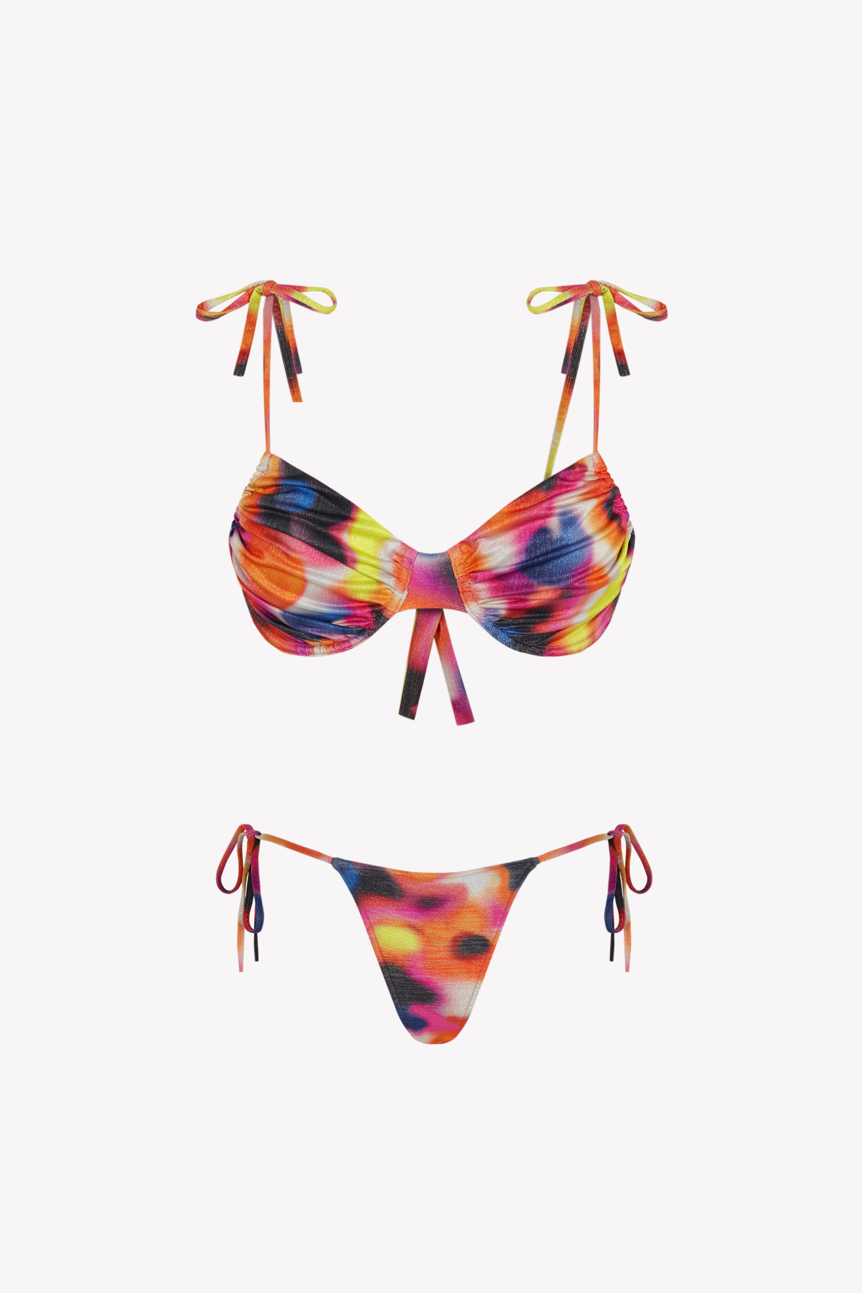 Bikini sostenible Gara Lise Calei. Top con aro y tirantes ajustables, braga tanga con lazadas. Tejido reciclado ECOWAVE® con estampado tie-dye y acabado lúrex. Hecho a mano en España.