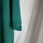 Camiseta oversize unisex en color verde, confeccionada en 100% algodón orgánico, con impresión digital exclusiva en la parte delantera. Moda streetwear sostenible