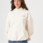 Sudadera oversize unisex con capucha en color blanco beige, confeccionada en algodón orgánico 100% con acabado French Terry. Su diseño exclusivo, con impresión digital en la parte delantera y trasera, combina comodidad, estilo y sostenibilidad. Una hoodie streetwear perfecta para un look casual y versátil.